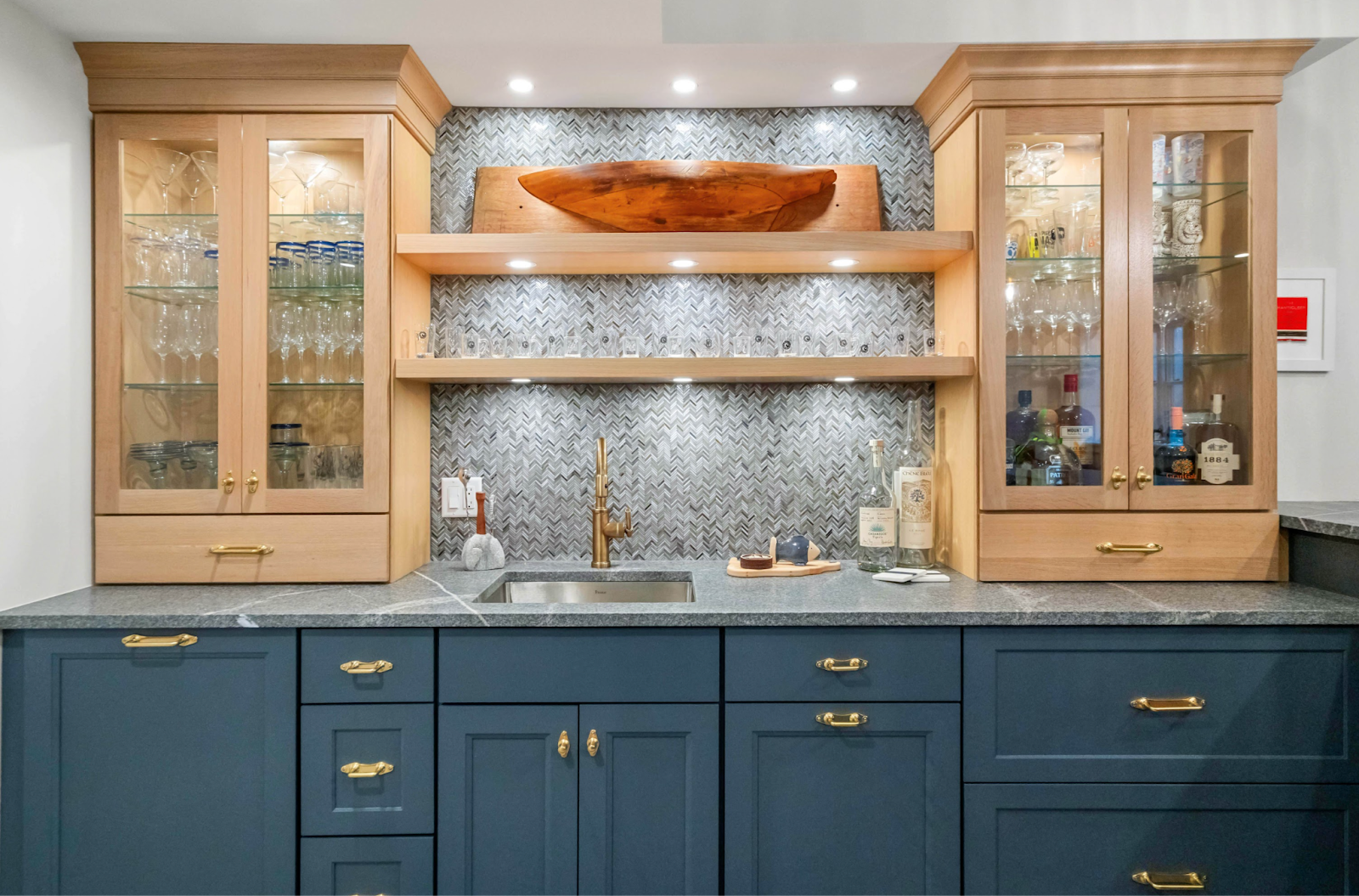 This image depicts a cozy bar area featuring simple glass cabinets.
