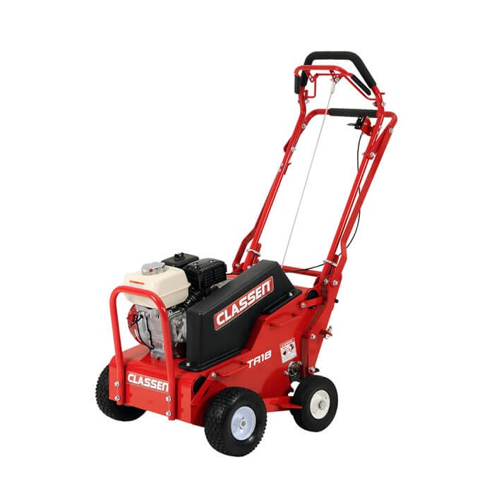 Red aerator machine with wheels and handlebars, designed for lawn care and soil aeration.