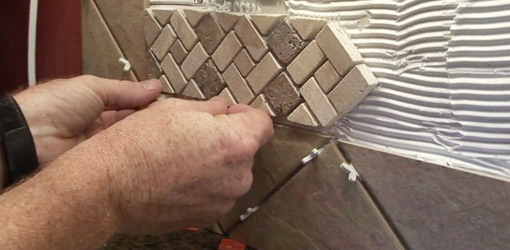 installing ceramic tiles on a kitchen backslash