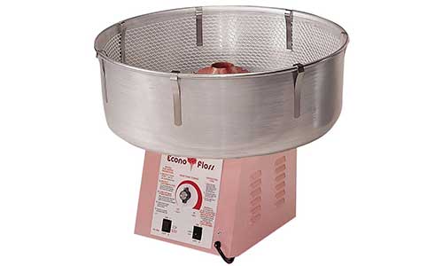 Commercial cotton candy machine with a metal bowl and pink base, featuring control switches and a label.