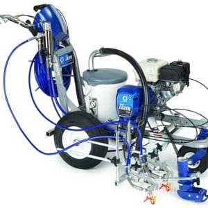 Airless line striper with attached paint reservoir and hoses on wheels, used for marking parking lots and sports fields.