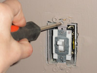Unscrew the existing switch