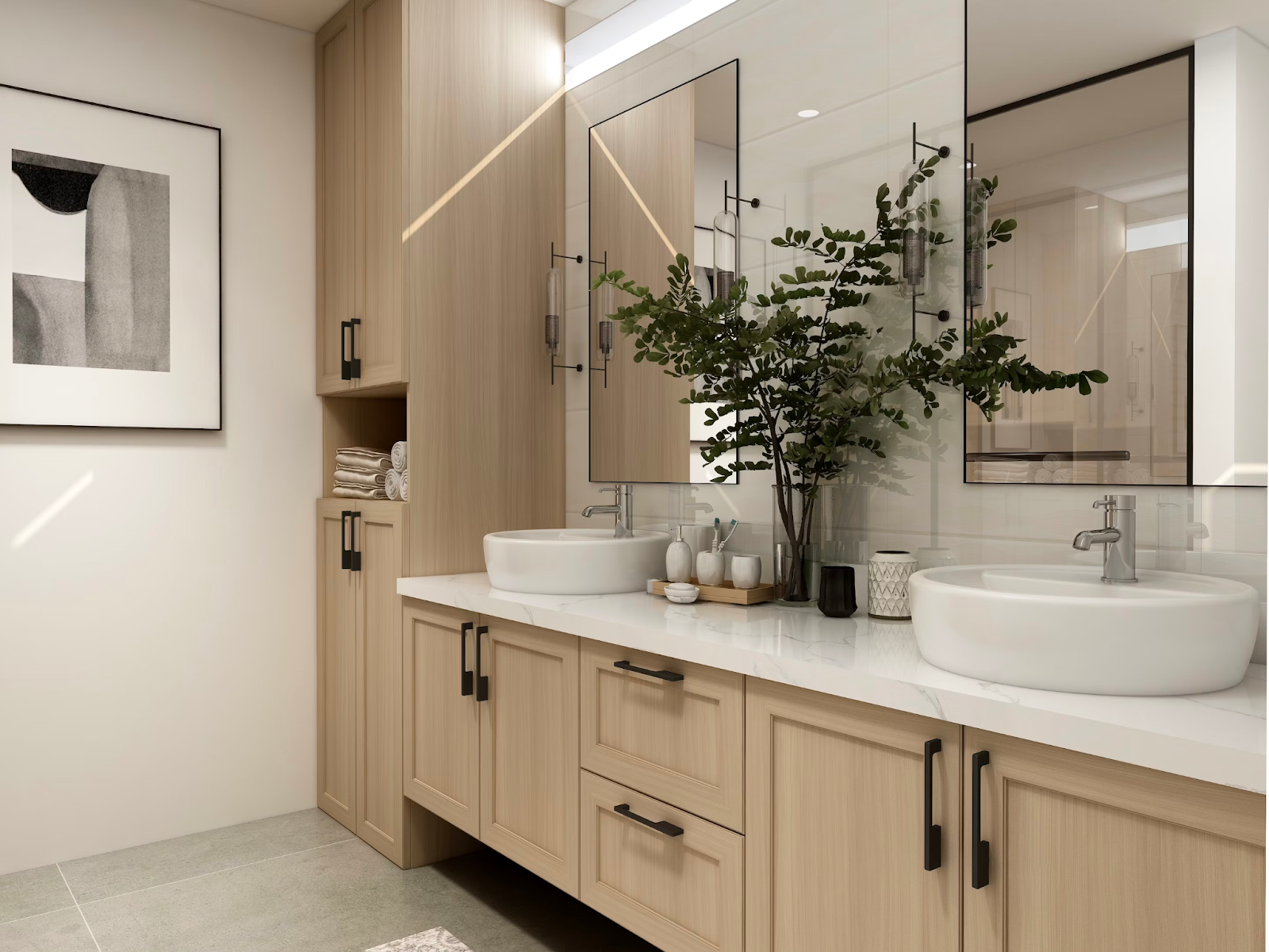 The picture depicts two bathroom sinks with a potted fern in the middle. The cabinetry is khaki-colored with black hardware. 