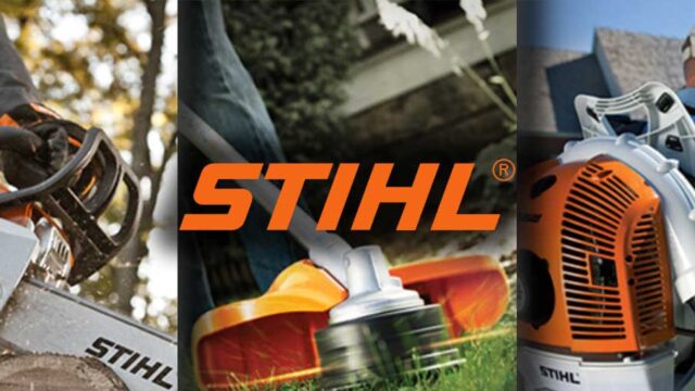Stihl branded lawn trimmer in use with close-up on cutting head and vibrant orange details in a garden setting.