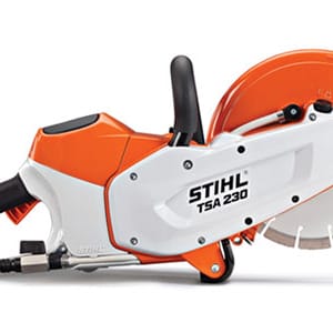Electric chainsaw with an orange and white casing, labeled Stihl TSA 230, resting on a flat surface.